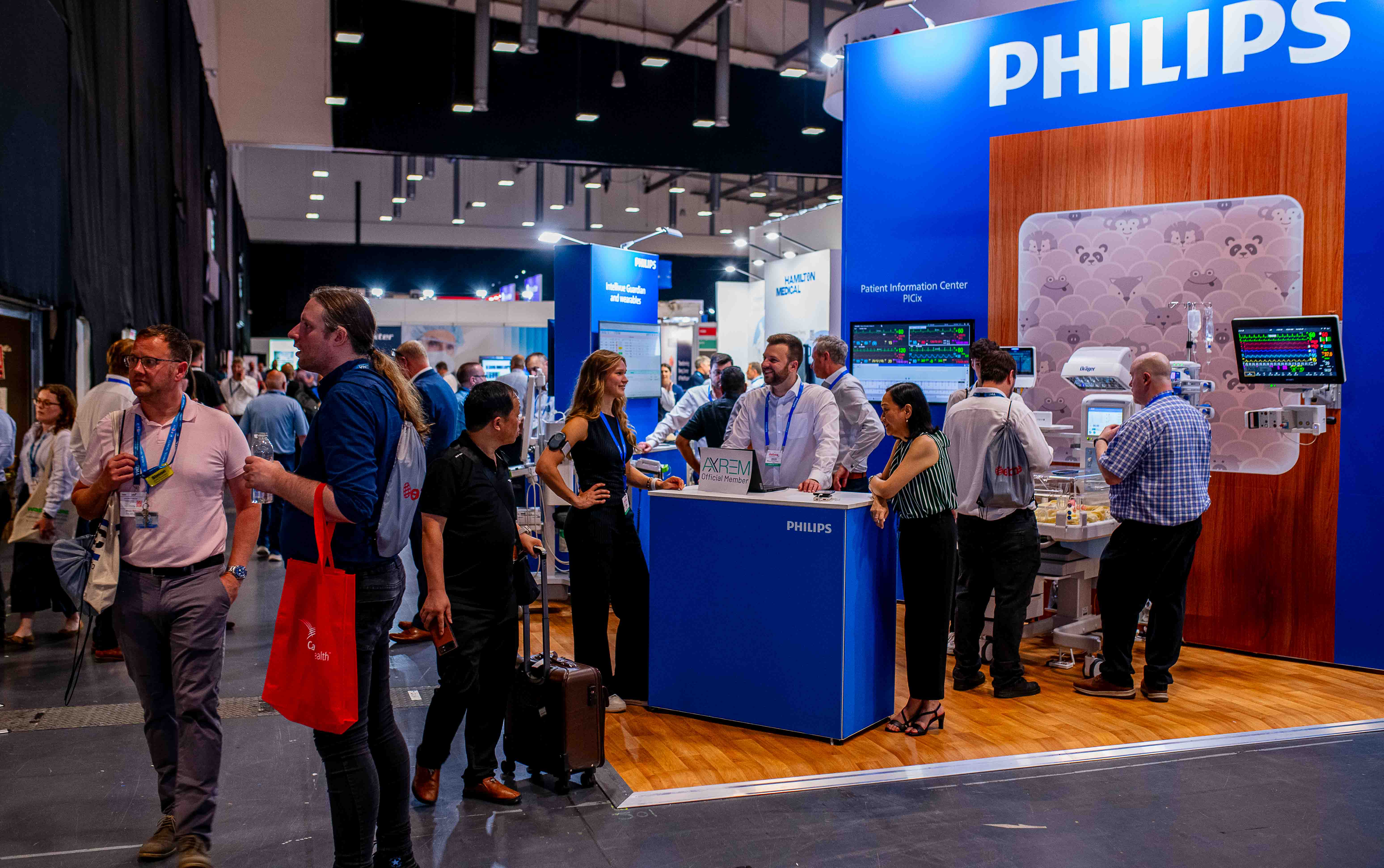 Visitors and exhibitors networking at EBME Expo
